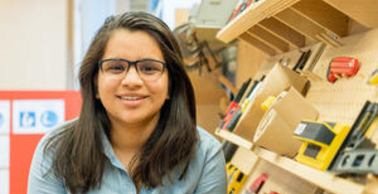 Student smiling at camera